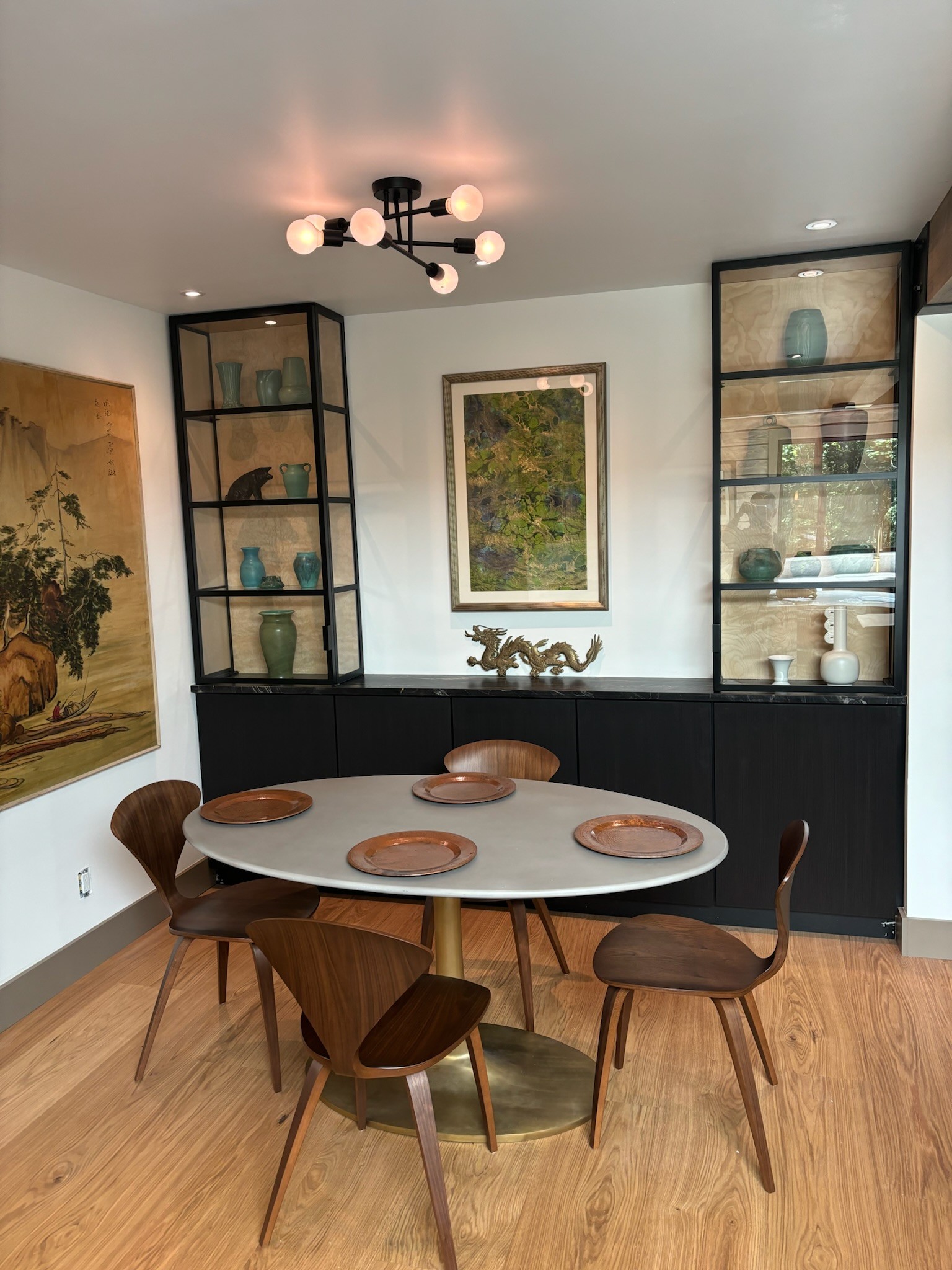 Built-in cabinet and glass-front display cabinets in a dining room