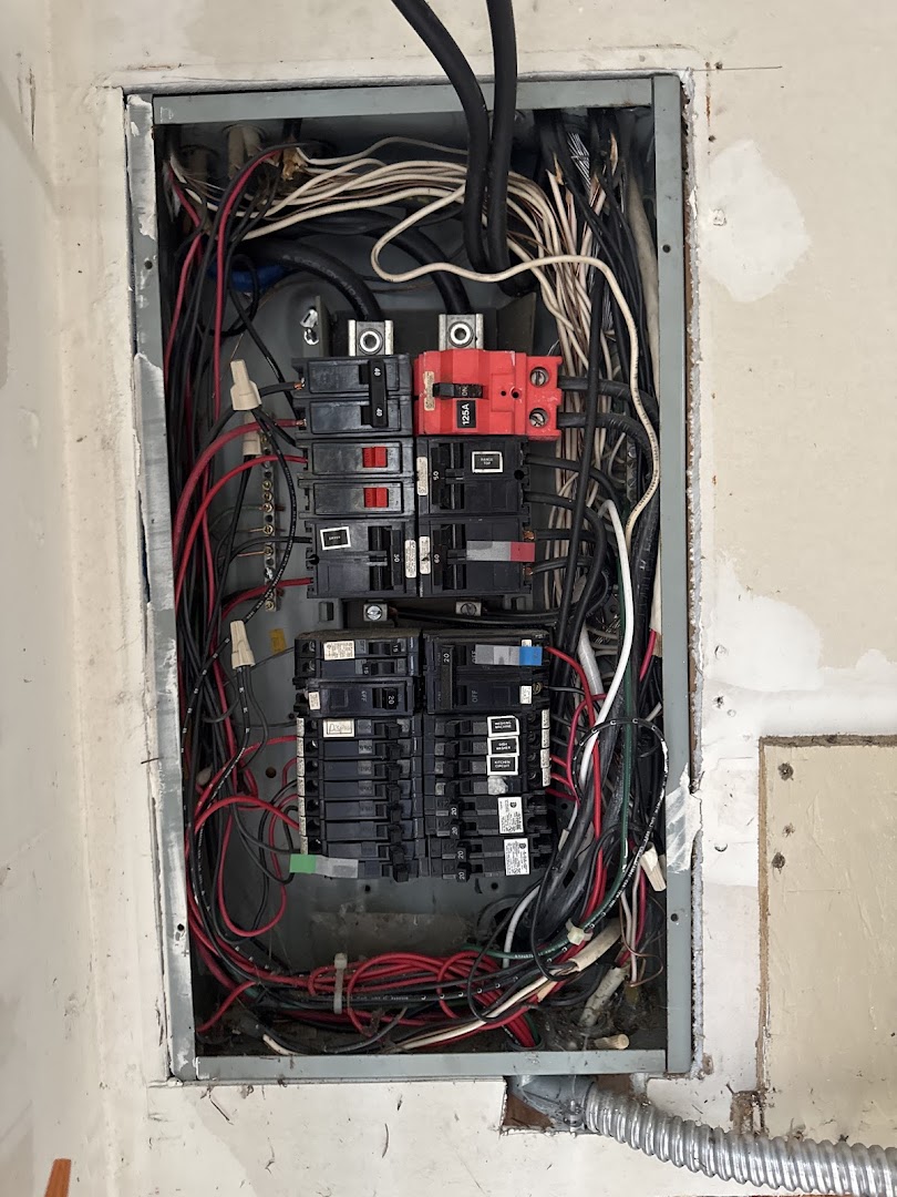A clean, professionally finished high-efficiency heat pump installation in a modern Woodinville utility room